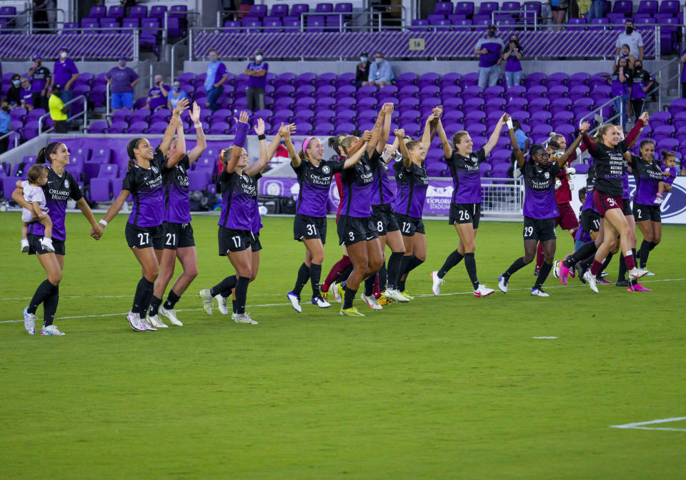 Orlando Pride celebrate with the fans after the NWSL soccer match between the Orlando Pride and theWashington Spirit on May 16, 2021 at Explorer Stadium in Orlando, FL. (Photo by Andrew Bershaw/Icon Sportswire via Getty Images)