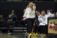 Baylor head coach Nicki Colleen points to the other side of the court after the ball goes out of bounds in the first half of an NCAA college basketball game against Missouri in Waco, Texas, Saturday, Dec. 4, 2021. (AP Photo/Emil Lippe)