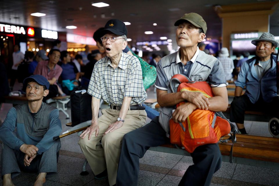 <p>People watch a TV broadcast of a news report on North Korea’s Hwasong-14 missile, a new intercontinental ballistic missile, which they said is successfully tested, at a railway station in Seoul, South Korea, July 4, 2017. (Photo: Kim Hong-Ji/Reuters) </p>