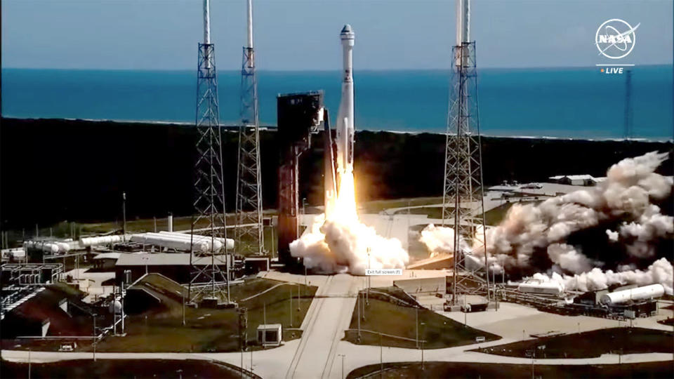 A United Launch Alliance Atlas 5 rocket roars away from its Cape Canaveral launch pad, propelling Boeing's Starliner crew capsule into space for its first piloted test flight.  The rocket and spacecraft were years behind schedule due to technical problems and appeared to perform flawlessly during the climb to orbit.  /Credit: NASA