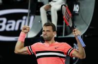 Tennis - Australian Open - Rod Laver Arena, Melbourne, Australia, January 17, 2018. Bulgaria's Grigor Dimitrov celebrates winning his match against Mackenzie McDonald of the U.S. REUTERS/Issei Kato