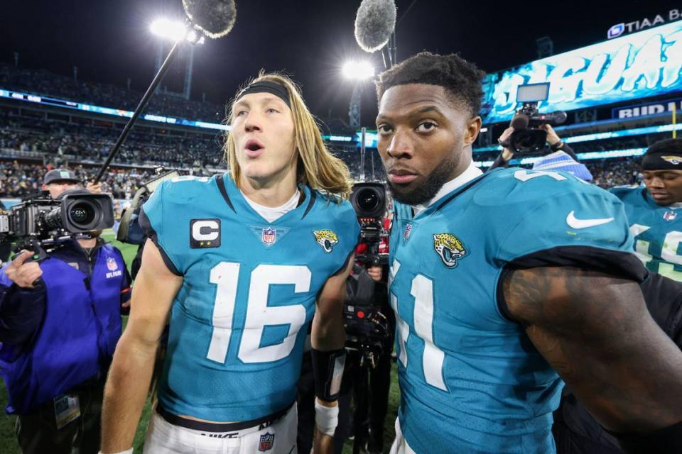 Jacksonville Jaguars linebacker Josh Hines-Allen (41) celebrates with quarterback Trevor Lawrence (16) after the team’s playoff win in January 2023. Hines-Allen is entering his sixth NFL season with the Jaguars in 2024.