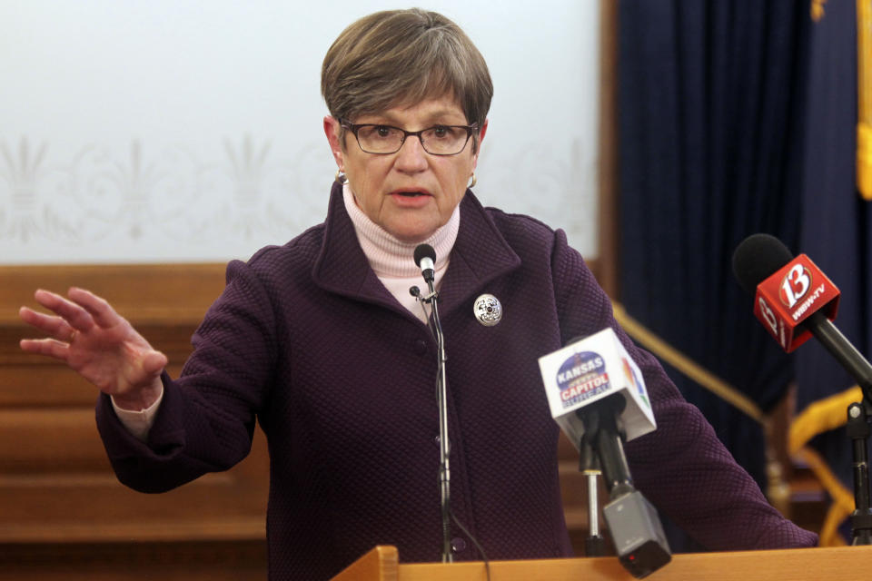 FILE - Kansas Gov. Laura Kelly speaks to reporters during a news conference, Wednesday, Feb. 3, 2021, at the Statehouse in Topeka, Kan. Responding to concerns from state officials, the U.S. Treasury Department said Wednesday, March 17, 2021 that states can cut taxes without penalty under a new federal pandemic relief law — so long as they use their own funds to do so. Kelly, who vetoed two GOP tax-cutting bills in 2019, welcomed the restrictions on using federal pandemic aid to offset state tax cuts. She said Kansas is still “digging out” from several years of budget shortfalls that followed a tax-cutting experiment in 2012-13 under Republican Gov. Sam Brownback. (AP Photo/John Hanna)