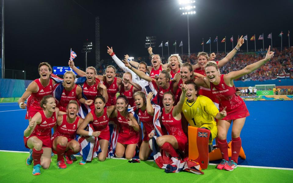 GB women's hockey team celebrate