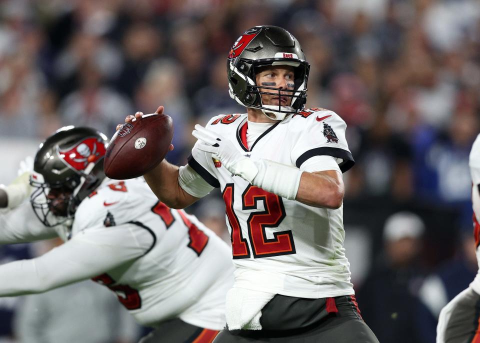 Jan 16, 2023; Tampa, Florida, USA; Tampa Bay Buccaneers quarterback Tom Brady (12) drops back to pass against the Dallas Cowboys in the second half during the wild card game at Raymond James Stadium. Mandatory Credit: Nathan Ray Seebeck-USA TODAY Sports