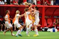 Jun 27, 2015; Vancouver, British Columbia, CAN; England midfielder Jill Scott (8) celebrates with teammates after defeating Canada in the quarterfinals of the FIFA 2015 Women's World Cup at BC Place Stadium. England won 2-1. Mandatory Credit: Anne-Marie Sorvin-USA TODAY Sports