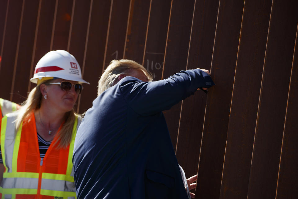 President Donald Trump signed his name on a section of the U.S.-Mexico border wall during a tour of the Otay Mesa area on Wednesday. (Photo: ASSOCIATED PRESS)