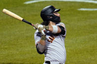 San Francisco Giants' Brandon Crawford watches his solo home run off Pittsburgh Pirates relief pitcher Duane Underwood Jr. during the eighth inning of a baseball game in Pittsburgh, Friday, May 14, 2021. (AP Photo/Gene J. Puskar)