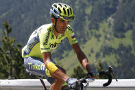 <p>Spain’s Alberto Contador strains as he rides at the back of the pack during the ninth stage of the Tour de France cycling race over 184.5 kilometers (114.3 miles) with start in Vielha Val d'Aran, Spain, and finish in Andorra Arcalis, Andorra, Sunday, July 10, 2016. Contador abandoned halfway through the stage with a fever. (AP Photo/Christophe Ena)</p>