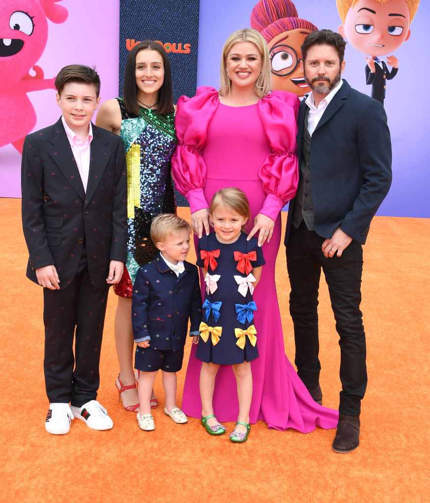 Kelly Clarkson poses with her kids and Brandon Blackstock at the L.A. premiere of 