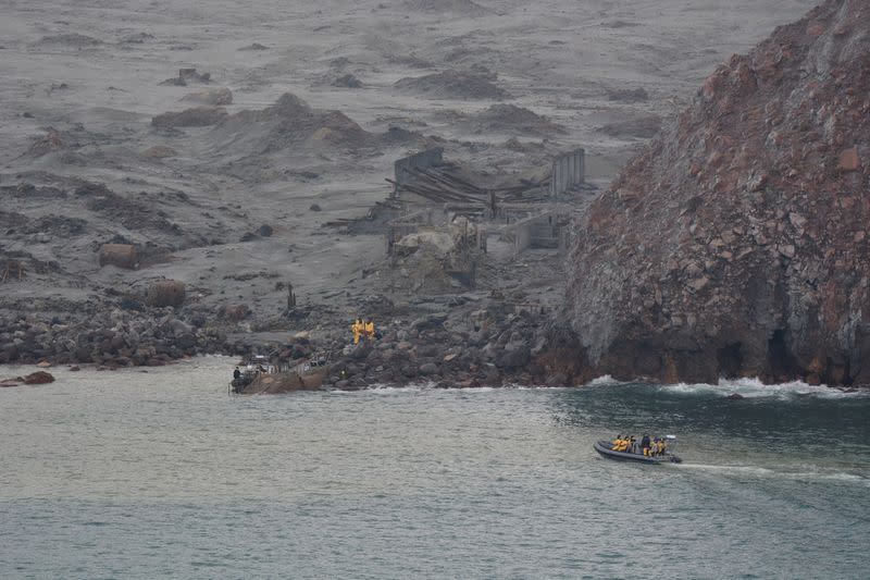 Rescue crew are seen at the White Island volcano in New Zealand