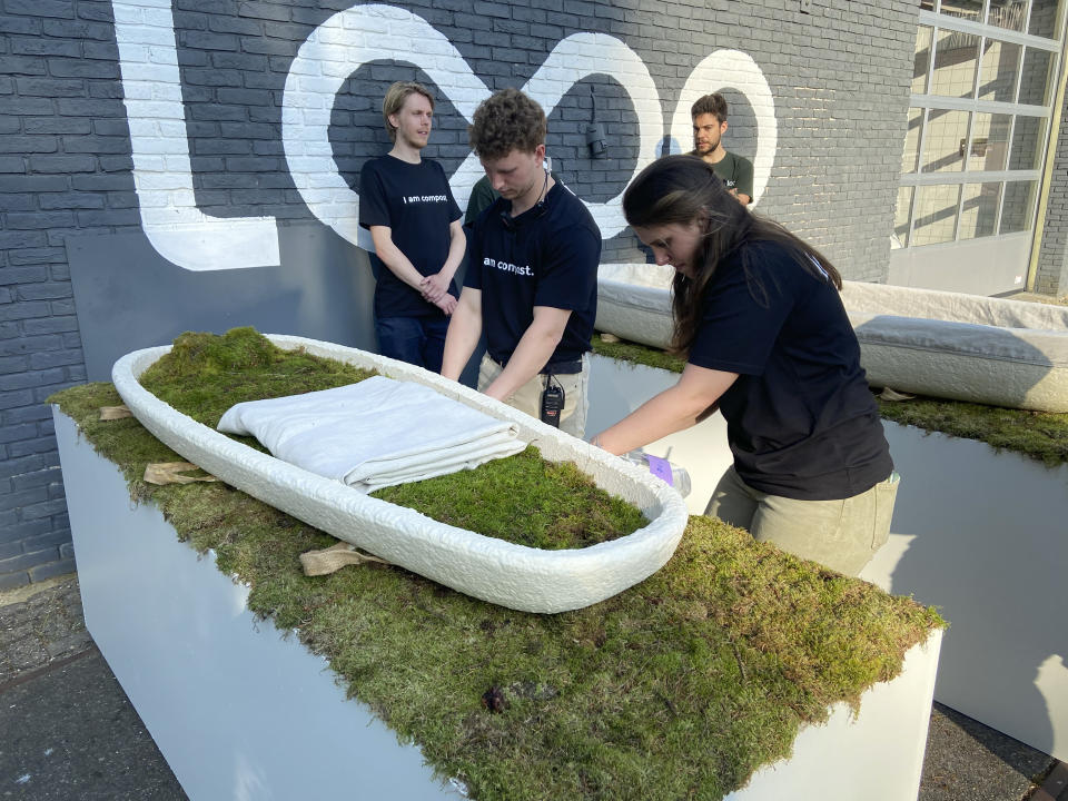 Dutch startup Loop Biotech displays cocoon-like coffins, grown from local mushrooms and up-cycled hemp fibres, designed to dissolve into the environment amid growing demand for more sustainable burial practices, in Delft, Netherlands, Monday, May 22, 2023. A Dutch intrepid inventor is now “growing” coffins by putting mycelium, the root structure of mushrooms, together with hemp fiber in a special mold that, in a week, turns into what could basically be compared to the looks of an unpainted Egyptian sarcophagus. (AP Photo/Aleksandar Furtula)