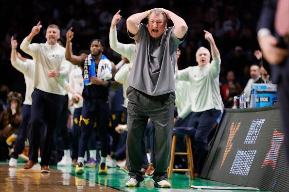 Head coach Bob Huggins of the West Virginia Mountaineers reacts to his team's loss.