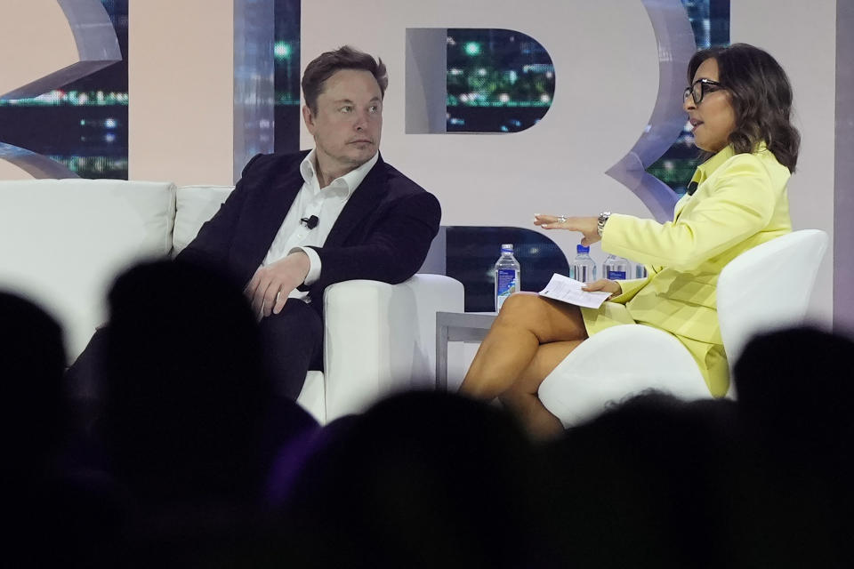 FILE - Elon Musk, left, speaks with Linda Yaccarino, chairman of global advertising and partnerships for NBC, at the POSSIBLE marketing conference, April 18, 2023, in Miami Beach, Fla. A Senate committee has issued bipartisan subpoenas to the CEOs of Discord, Snap and X, demanding that the heads of the three companies testify at a December hearing on protecting children online. Senate Judiciary Committee Chairman Dick Durbin and Rep. Lindsey Graham, R-S.C., announced Monday, Nov. 20, that they had issued the subpoenas to Discord CEO Jason Citron, Snap CEO Evan Spiegel and Linda Yaccarino, the CEO of X, formerly known as Twitter. (AP Photo/Rebecca Blackwell, File)