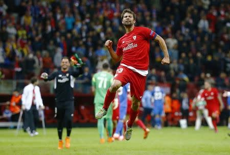 Football - Dnipro Dnipropetrovsk v Sevilla - UEFA Europa League Final - National Stadium, Warsaw, Poland - 27/5/15 Sevilla's Coke celebrates winning the UEFA Europa League Final Reuters / Kai Pfaffenbach