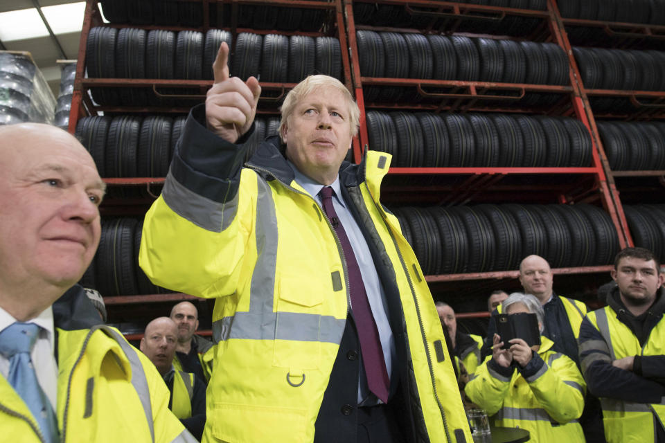 Britain's Prime Minister Boris Johnson talks during a question and answer session, part of a General Election campaign visit to Ferguson's Transport in Washington, England, Monday, Dec. 9, 2019. Britain goes to the polls on Dec. 12. (Ben Stansall/Pool Photo via AP)