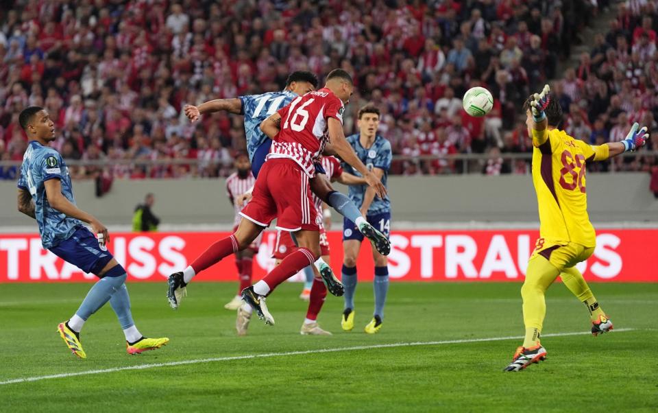 Ollie Watkins and David Carmo go up for a header