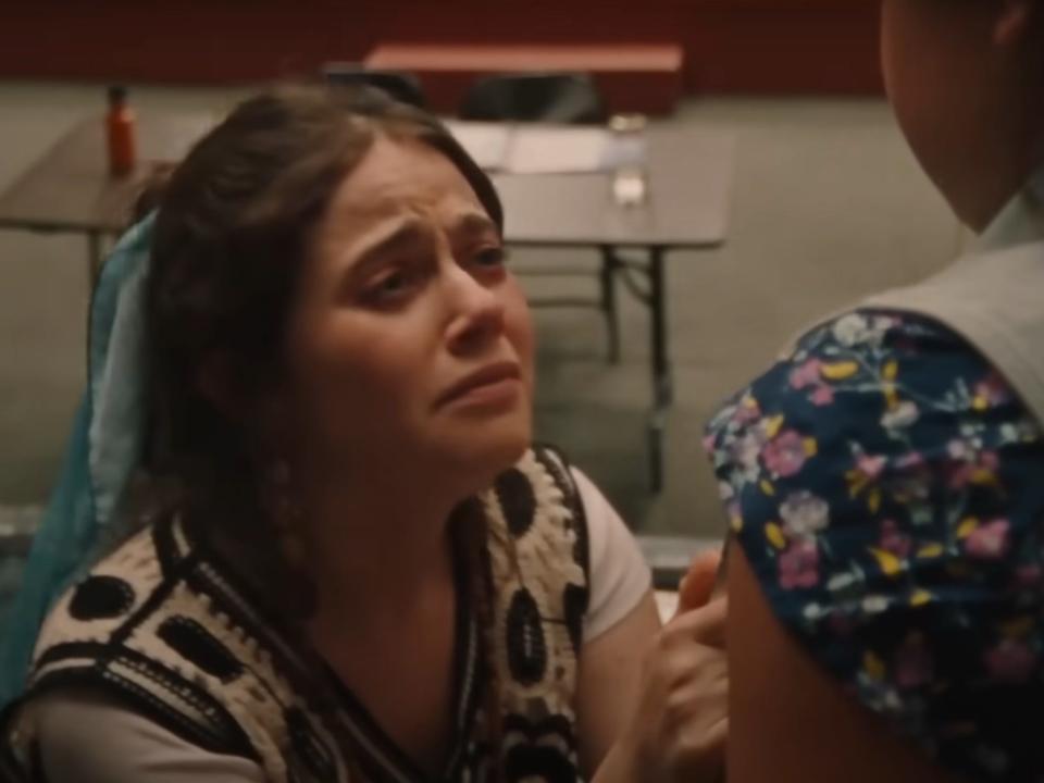 Molly Gordon fake crying in a scene from theater camp