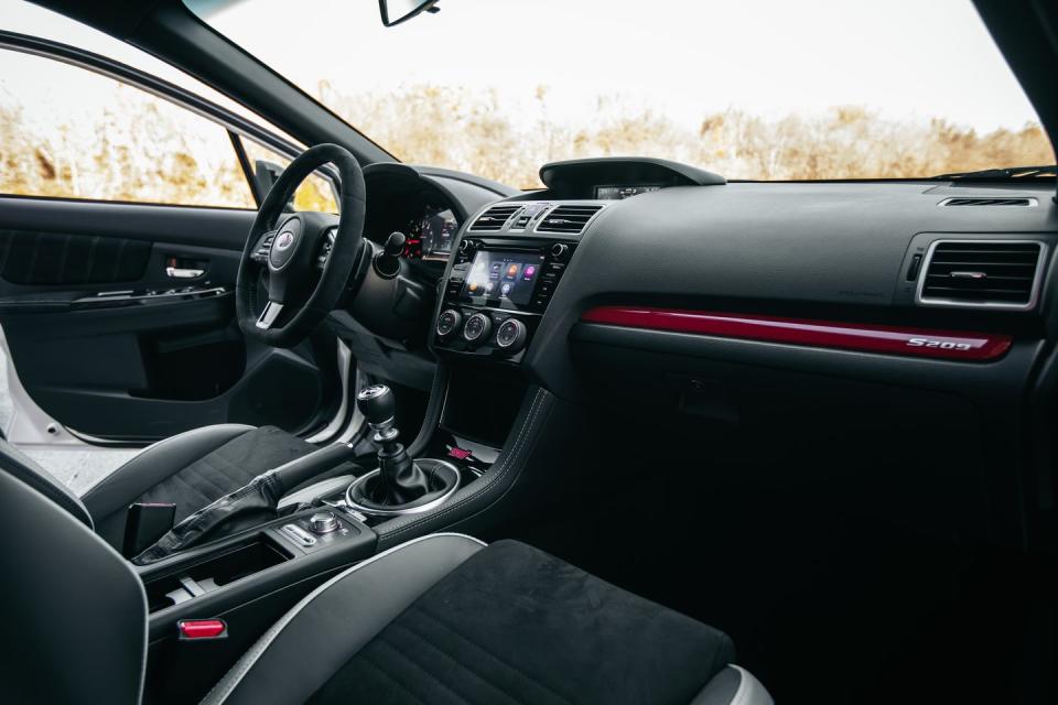 <p>The only interior differentiators are a few badges and some whitish-silver trim on the Recaro seats.</p>