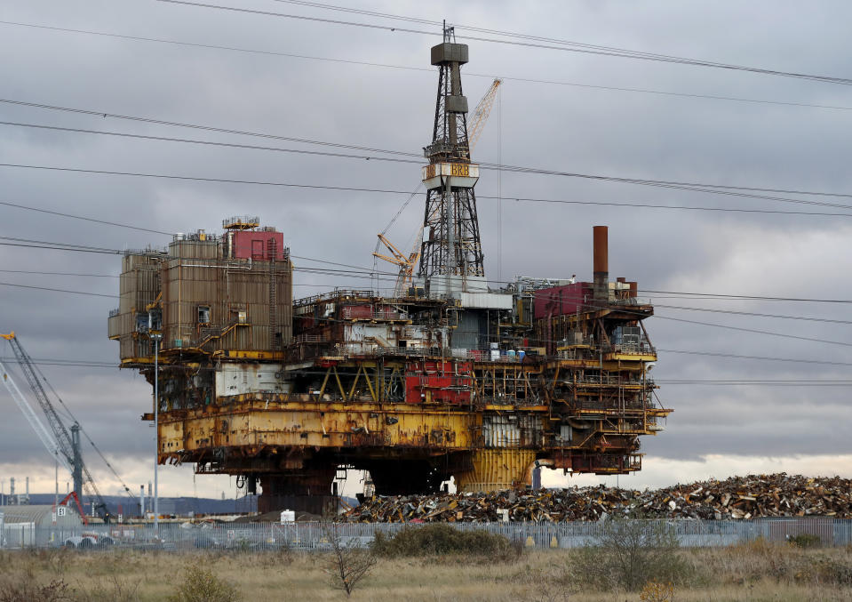 An old decommissioned oil platform sits on land where it is being demolished in Hartlepool, England, Monday, Nov. 11, 2019. Britain's political parties are battling to win Hartlepool and places like it: working-class former industrial towns whose voters could hold the key to 10 Downing Street, the prime minister's office. Once-bustling shipyards are closed, though rusting hulks are reduced to scrap at a site just outside town. Most of the steelworks that once employed thousands shut down in the 1970s and 1980s. (AP Photo/Frank Augstein)