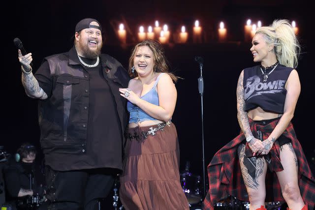 <p>Amy Sussman/Getty </p> Jelly Roll, Bailee Ann and Bunnie Xo appear on the T-Mobile Mane Stage at Stagecoach on April 26, 2024