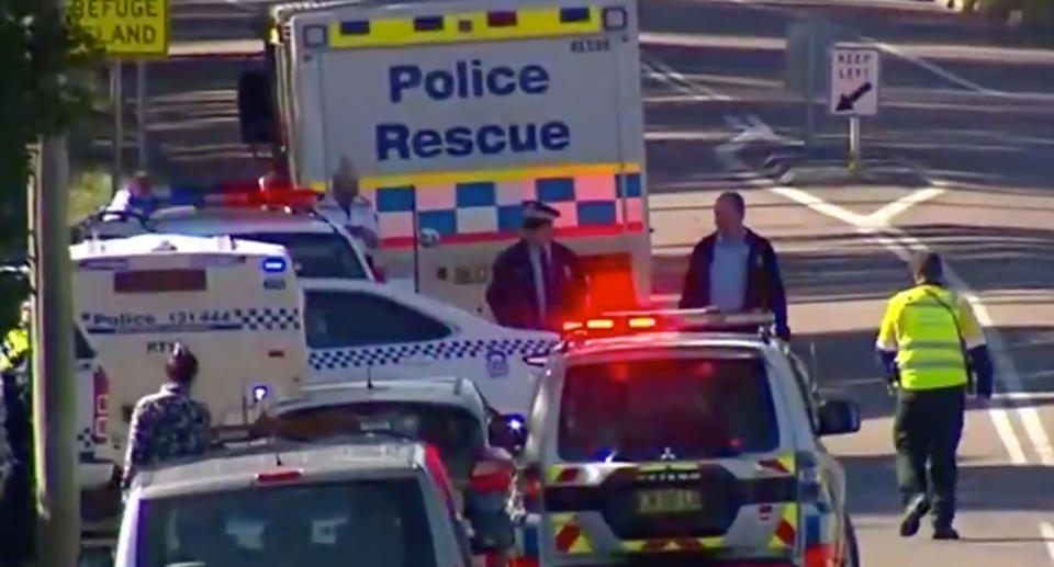 Police on Mount Hall Road in Raymond Terrace on Tuesday after 15-year-old boy was hit by a bus while riding his bike near the school.