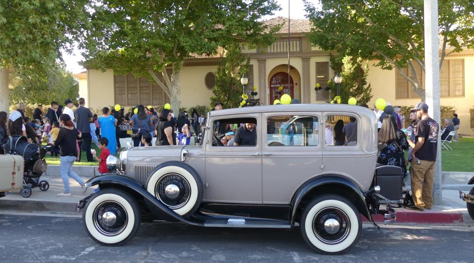 One of several vintage vehicles parked in front of the Sixth Street Prep during the building’s 100th anniversary celebration in downtown Victorville.