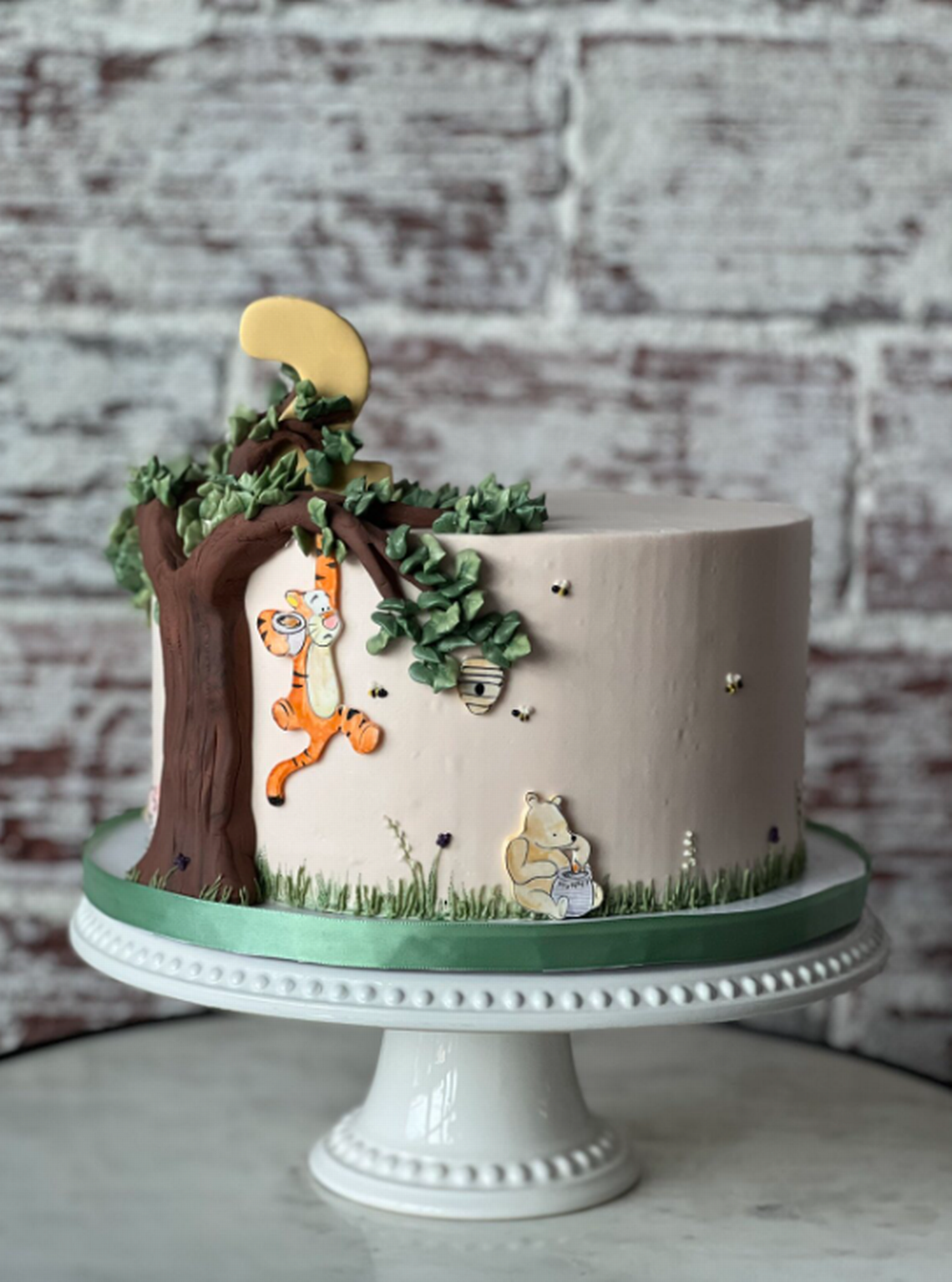 Winnie the Pooh themed cake from Layered Cake Artistry Courtesy: Layered Cake Artistry cake portfolio