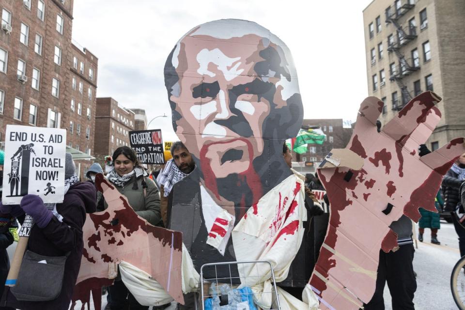 Demonstrators take part in the ‘Biden: stop supporting genocide!" rally in New York City on 20 January (Reuters)