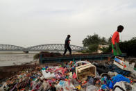 Koran students, called talibes, search for food in a rubbish container in Saint-Louis, Senegal, February 6, 2019. REUTERS/Zohra Bensemra