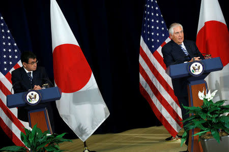 U.S. Secretary of State Rex Tillerson (R), together with Japan's Foreign Minister Taro Kono (L), holds a news conference after their U.S.-Japan Security talks at the State Department in Washington, U.S., August 17, 2017. REUTERS/Jonathan Ernst