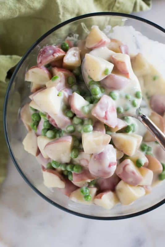 <p>Tastes Better from Scratch</p><p>Creamy red potatoes and peas is an old-fashioned, classic recipe with potatoes and peas in a delicious cream sauce.</p><p><strong>Get the recipe: <a href="https://tastesbetterfromscratch.com/creamy-red-potatoes-and-peas/" rel="nofollow noopener" target="_blank" data-ylk="slk:Creamed Red Potatoes and Peas;elm:context_link;itc:0;sec:content-canvas" class="link rapid-noclick-resp">Creamed Red Potatoes and Peas</a></strong></p>