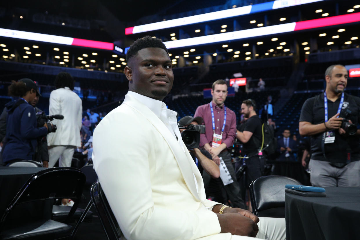 Like LeBron James, Zion Williamson rocked all white for his NBA draft night. (Reuters)