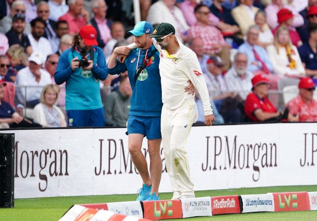 Lyon was helped from the field during the second day at Lord's 