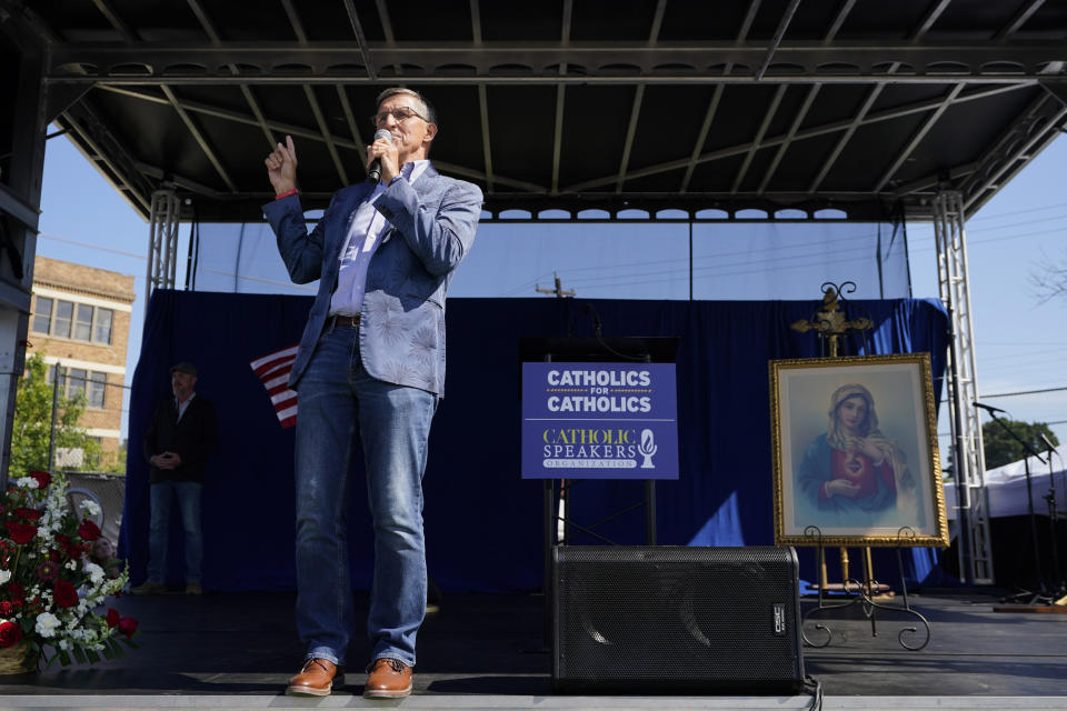 Former national security adviser Michael Flynn speaks during a "rosary rally" on Sunday, Aug. 6, 2023, in Norwood, Ohio. A national religious organization, Catholics for Catholics, gathered a lineup of anti-abortion influencers and conspiracy theorists from across the U.S. to speak at the rally to urge a “yes” vote on a ballot question in Ohio, known as Issue 1, that would make it harder to change the state constitution and could determine the fate of abortion rights. (AP Photo/Darron Cummings)