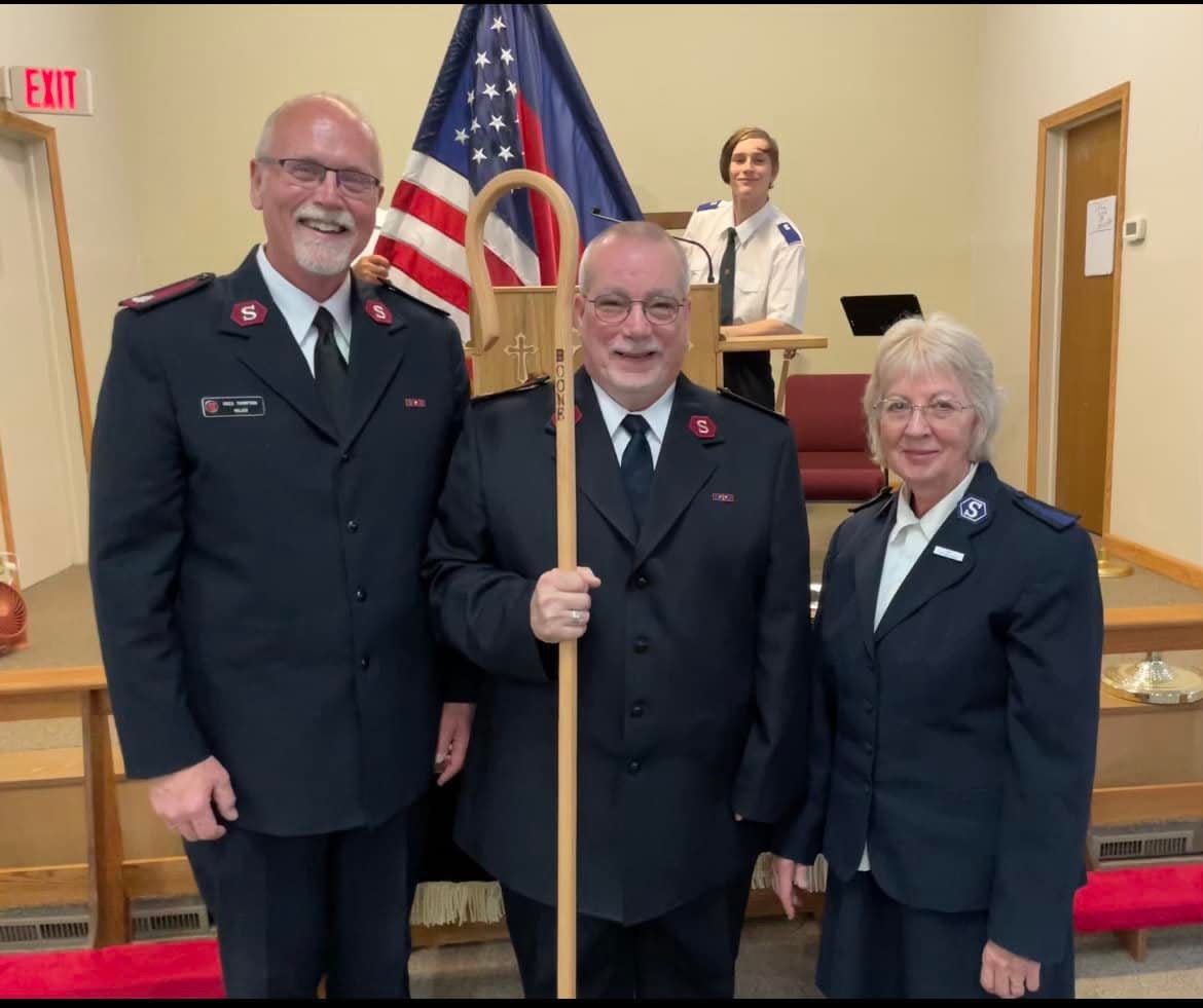 Mark Litherland was installed as leader of the Boone Salvation Army on July 3. Left to right: Major Greg Thompson, Divisional Commander of the Western Division; Litherland; CSM Sharon Hunter. Far back: Timothy Kepple.