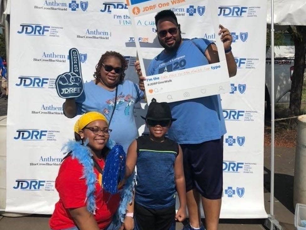 The Owens family posing for a photo