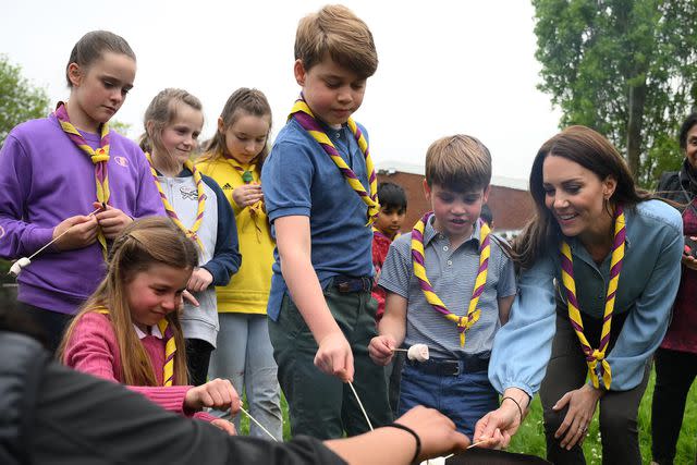 DANIEL LEAL/POOL/AFP via Getty From left: Princess Charlotte, Prince George, Prince Louis and Kate Middleton at the Big Help Out in May 2023