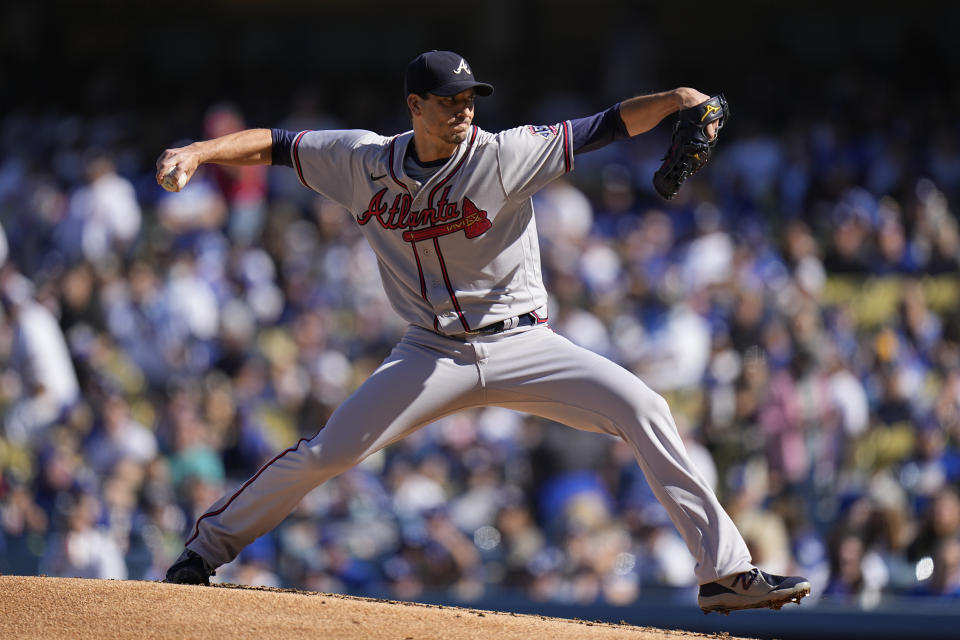 Atlanta Braves pitcher Chris Martin winds up to throw in the first inning against the Los Angeles Dodgers in Game 3 of baseball's National League Championship Series Tuesday, Oct. 19, 2021, in Los Angeles. (AP Photo/Jae Hong)