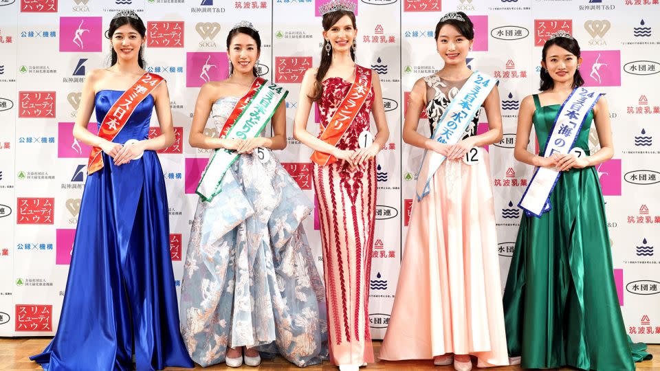 Karolina Shiino (center), the winner of Miss Nippon 2024, poses with other contestants at the pageant in Tokyo, Japan, on Jan, 22, 2024. - Miss Japan Association/Handout via Reuters