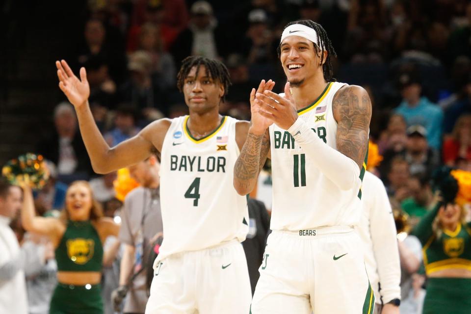 Mar 22, 2024; Memphis, TN, USA; Baylor Bears forward Jalen Bridges (11) and guard Ja'Kobe Walter (4) react during the second half against the Colgate Raiders in the NCAA Tournament First Round at FedExForum. Mandatory Credit: Petre Thomas-USA TODAY Sports