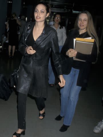 <p>Ron Galella, Ltd./Ron Galella Collection/Getty </p> Angelina Jolie and her mother Marcheline Bertrand in Los Angeles, California.