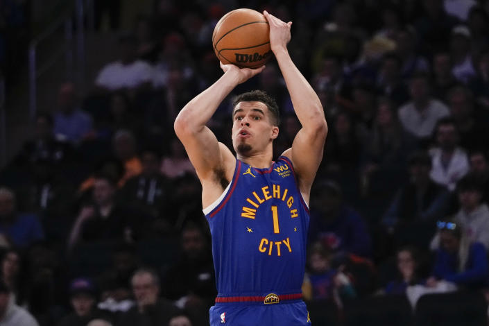 Denver Nuggets forward Michael Porter Jr. shoots a 3-point basket during the first half of an NBA basketball game against the New York Knicks, Saturday, March 18, 2023, at Madison Square Garden in New York. (AP Photo/Mary Altaffer)