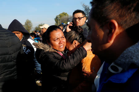 People gather at the scene of the explosion. Source: Reuters