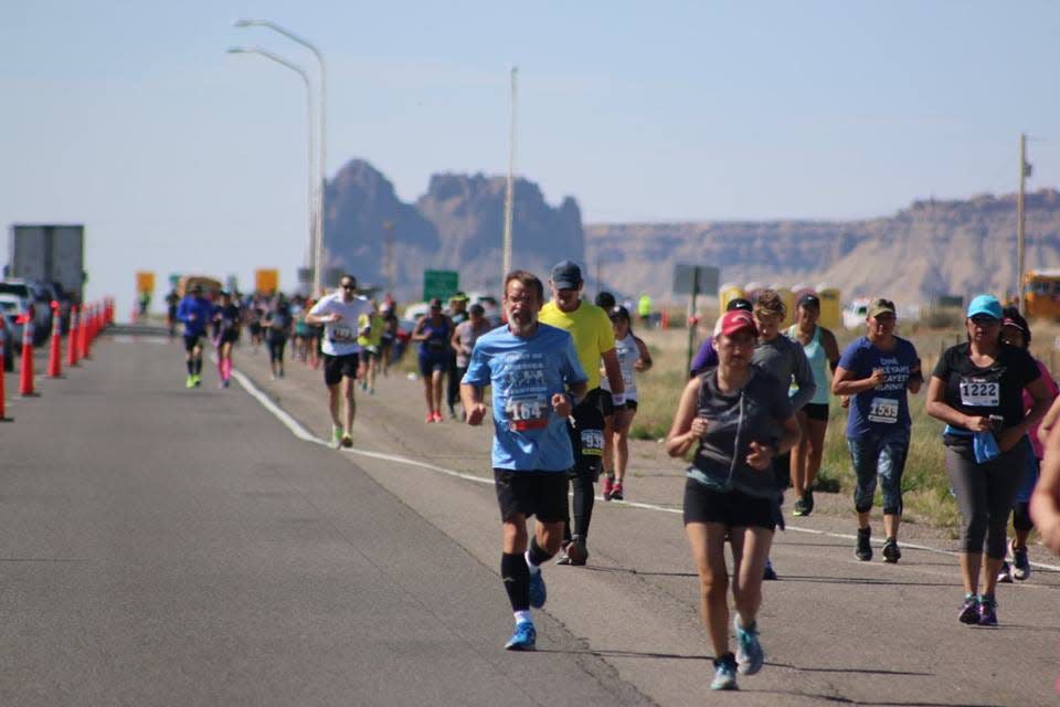 A group of runners are seen here taking part in the 2019 Shiprock Marathon.