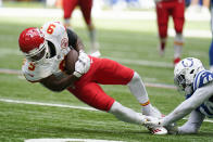 Kansas City Chiefs wide receiver JuJu Smith-Schuster (9) is tackled by Indianapolis Colts' Zaire Franklin (44) during the first half of an NFL football game, Sunday, Sept. 25, 2022, in Indianapolis. (AP Photo/Michael Conroy)