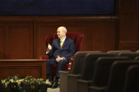 In this photograph provided by The Church of Jesus Christ of Latter-day Saints shows President Russell M. Nelson during The Church of Jesus Christ of Latter-day Saints' twice-annual church conference Saturday, April 4, 2020, in Salt Lake City. The conference kicked off Saturday without anyone attending in person and top leaders sitting some 6 feet apart inside an empty room as the faith takes precautions to avoid the spread of the coronavirus. A livestream of the conference showed a few of the faith's top leaders sitting alone inside a small auditorium in Salt Lake City, Normally, top leaders sit side-by-side on stage with the religion's well-known choir behind them and some 20,000 people watching. (The Church of Jesus Christ of Latter-day Saints via AP)