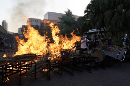 A barricade on fire is pictured during a demonstration by anti-government protesters in Sha Tin, Hong Kong