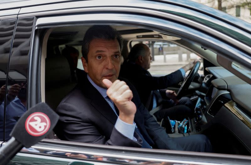 FILE PHOTO: Argentina's Economy Minister Sergio Massa speaks to reporters outside IMF headquarters in Washington