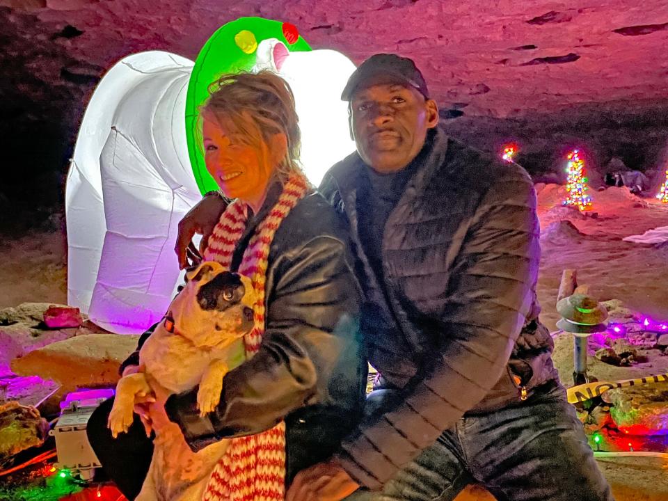 Stella the French bulldog brought her humans Karen Chapman and Tyrone Harper (former Vols basketball power forward) to Christmas in the Cave in the Historical Cherokee Caverns Sunday, Dec. 4, 2022